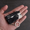 FoldSlingo - Folding Rubber Band Gun Military Keychain